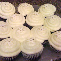 Snowflake Cupcakes I made these cupcakes to compliment my cake that no one was going to cut :) They are a cute little snowflake on a piped cupcake. I added a...