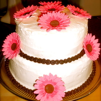 Gerber Daisy Cake These Gerber Daisies were so great to make, it was alot of fun. The cake was lemon with lemon frosting. The top layer is gluten free and it...