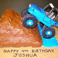 Jeep Cake This is a Jeep cake made for an adorable 4 year old. The Jeep is made of RKT and the cake is chocolate. Lots of fun.