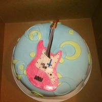 My First Cake For my brother in law's birthday. I tried making the Mark Hoppus from Blink 182's guitar.