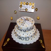 Black & Gold Graduation Cake Bottom layer: triple layer chocolate cake with vanilla buttercream and chocolate fudge frosing. Top layer: Vanilla cake with vanilla...