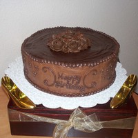 Birthday Brownie Cake Triple layer Brownie cake with chocolate buttercream, topped with chocolate Ganache!