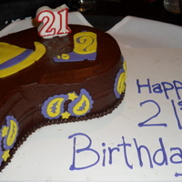 Cowgirl 21St paisley shaped cowgirl cake for my bestfriends 21st. chocolate cake with raspberry filling covered in chocolate frosting. The decorations...