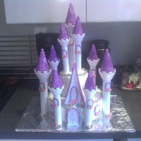 Castle First Birthday Castle, I used the Wilton Castle set, I really enjoyed making this cake but I would try to find a better way to adhere the...