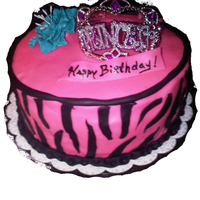 Pink Zebra Cake This cake was for a friend of the family, they wanted something frilly and girly. The crown is plastic. This was my first attempt at zebra...