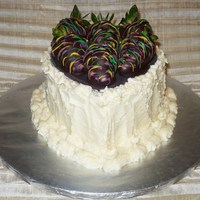 1 Year Dating Anniversary Cake This is a vanilla cake with strawberry puree filling, vanilla icing, dark chocolate heart plaque and dark chocolate-dipped strawberries...