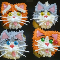 Kitty Cat Cupcakes This is my variation on the Hello, Cupcake! Kitty Cat Cupcakes.These were vanilla cupcakes with buttercream fur, royal icing whiskers, mini...