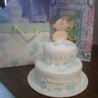 First Try With Fondant...messy But Fun! Baby shower cake for co-worker.