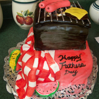 Happy Fathers Day This is my second cake ever! All edible. All Marshmallow Fondant. Handmade food and table cloth. Chocolate Cake with Chocolate Fudge on...