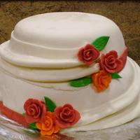 Anniversary Cake This cake was made with alternating layers of chocolate and strawberry cake with a strawberry filling. It was covered in marshmallow...