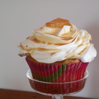 Caramel Apple Cupcakes Vanilla cupcakes with apple topping,buttercream icing and caramel sauce.