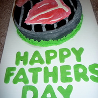 Father's Day Grill Cake a little dusty...its because we didnt have AC so the gum paste and fondant started to get stick so i had to dust cornstarch on it