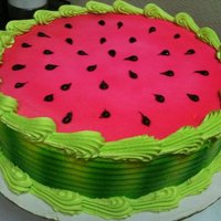 Watermelon Ice cream cake, color airbrushed on, piping gel seeds.