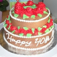 40Th Anniversary Red velvet cake, chocolate frosting. Red roses.