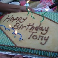 Masculine Birthday Cake Marked off lines so they would be evenly spaced. Devil's food cake with brown sugar buttercream.