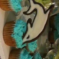 Beach Cupcakes Cupcakes for a wedding, dolphins and shells made from melting chocolate.