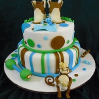 Monkey Shower Baby shower cake, put feet on board- styrofoam balls. I hope they hold up!Fondant, rattle styro covered w/fondant. Inspired by CCer's...