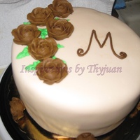 My First Wedding Anniversary Cake My first wedding anniversary cake. A cream cheese pound cake with buttercream and fondant. I just learned how to make roses the day before...