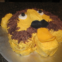 Lion Cake Lion cake made for the third birthday of my friend's grandson. Vanilla cake with buttercream, twinkie for nose and shaved chocolate...
