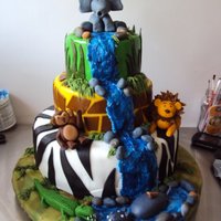 Safari Cake This was my first attempt at a three tiered fondant cake.