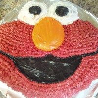 2Nd Birthday Wilton Elmo pan. Used star tip 18 to create the furry effect. Gently smoothed frosting for the other parts using cornstarch on wet finger....