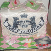 Juicy Couture Diaper Bag 6 layer cakes, top 2 tiers Dominican Cake with Pineapple filling, middle tier Butter Cake with French Vanilla Buttercreme filling, last 2...