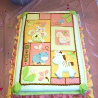 Baby Shower Animal Themed Cake The mother to be wanted me to match her nursery theme so I tried to replicate the quilt she bought with all the animals. White almond cake...