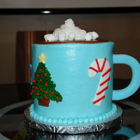 Hot Chocolate Four layer alternating chocolate and vanilla cake and buttercream frosting with fondant accents. I made this for my daughter's holiday...