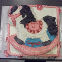 Baby Girl Rocking Horse My boss was expecting a baby girl. Used the Wilton Rocking Horse mold and a 16" square cake for the base. Bottom is chocolate with...