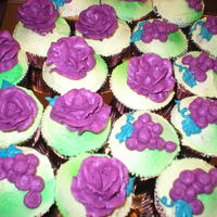 Grapes And Roses Vanilla bean cupcakes with Vanilla frosting. Who says cupcakes have to be exactly the same. These match!