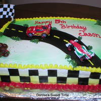 Cars 2 Cake Used Wilton Sugar Sheets for the checkerboard. First time using them.. They worked great and are so easy to use!