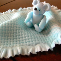 Baby Boy Blue Teddy & Blanket Teddy bear is cupcake size, the blanket is a little larger