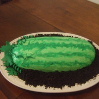 Watermelon Cake. pink cake with chocolate sprinkles (for the 'seeds'), butter cream frosting, vines and leaves are fondant, and the 'dirt&#...