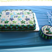 Boy Stars First Birthday Cake My third cake!! For my son's first birthday. Cake matched his invitations. Half chocolate and half white, with buttercream frosting.