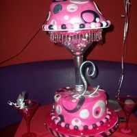 Pink And Black pink lemonade chiffon cake with strawberry lemonade filling. For my little sisters birthday. top tier supposed to look like a hat