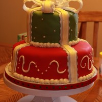 Christmas Gift Cake Top tier = matcha green tea cakeBottom tier = red velvet cake
