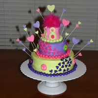 Peace And Love Yellow cake and buttercream icing with fondant trim.