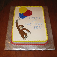 Curious George Cake Marble cake with buttercream icing and color flow Curious George