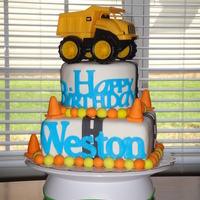 Dump Truck Birthday Cake Dump truck cake made using all MMF. The bottom tier is 8" square and the top is 6" round. The phrase "Happy Birthday"...
