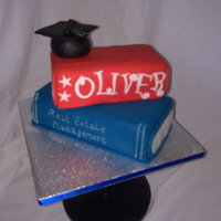Graduation Cake Made for a friend's boyfriend who had just completed Real Estate Management Degree and graduated with a 2:1. Lemon cake covered with...