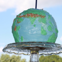 Globe Birthday Cake It was for my son's 8th birthday, he enjoyed helping me to place continents and the mountains in the right places, and the hurricane...