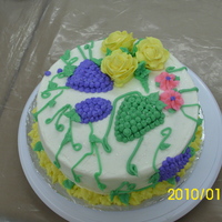 Cake With Grapes This is my first cake with grapes, green and purple. Made from buttercream