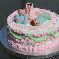 Happy Mother's Day Customer wanted a cake with 3 babies on it to represent herself and her brothers.