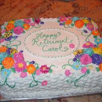 Retirement Cake 11x15 white almond sour cream cake with raspberry fillling.