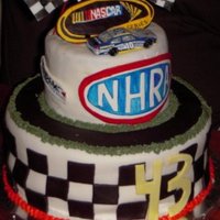 Nascar Birthday Cake A cake for my coworker's husband's 43rd birthday and my first attempt at a two tiered cake. She and I worked on it together and...