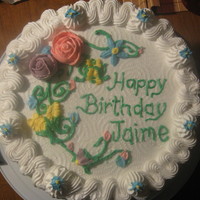 Chocolate Strawberry Cake Three layer dark chocolate almond sour cream cake with a strawberry filling. Covered and decorated with buttercream frosting. Candy coated...