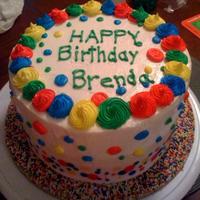 Multi-Colored Polka Dots Double Layer CASC cake. Dulce de Leche filling. Buttercream frosting and decorations. I know that lettering is of center, lop-sided and...