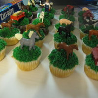 Farm Animal Cupcakes Cupcakes with piped "grass" in green BC.