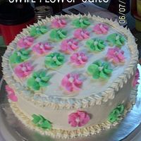 Swirl Flower Cake I made a lot of swirl flowers out of BC and decided to use them on a cake.
