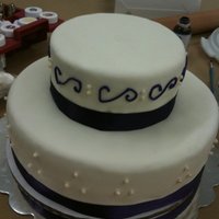 Mock Wedding Cake My first tiered cake. Covered in fondant, real ribbon border, sugar pears.